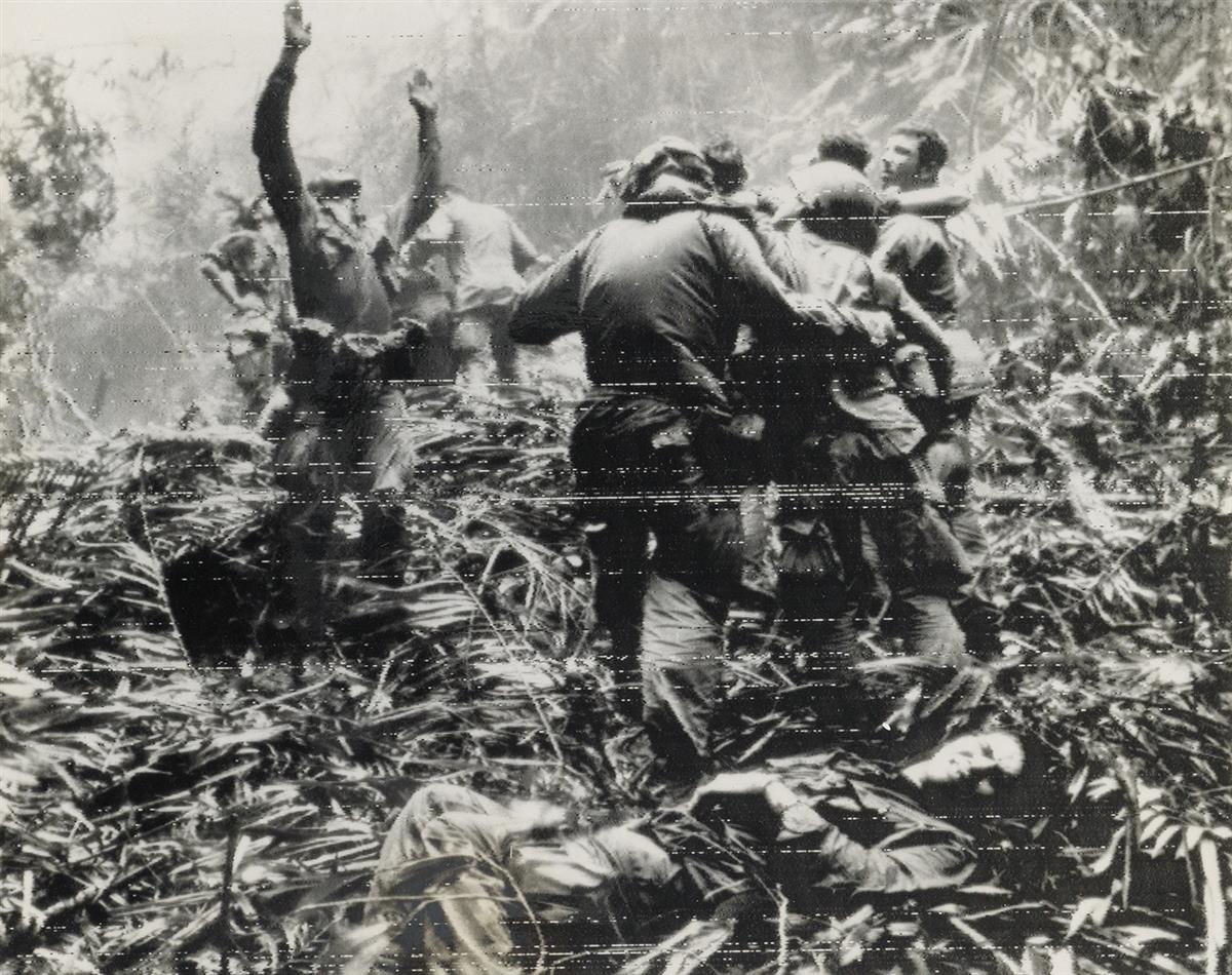 (VIETNAM WAR) CHARLES EGGESTON; NIK WHEELER Group of more than 45 dramatic press photographs by two prominent photojournalists related